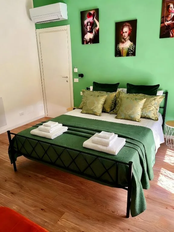 Triple Room with Balcony — Sea Breeze Suites