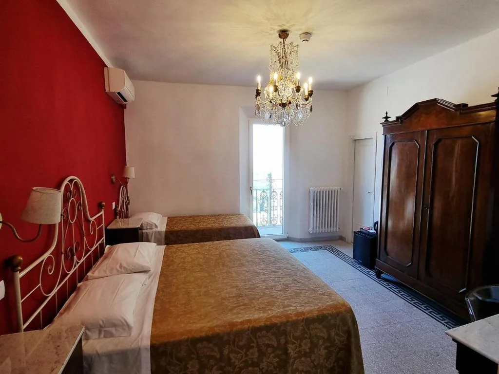 Camera Tripla con Terrazza — Albergo Il Marzocco – Hotel dal 1860