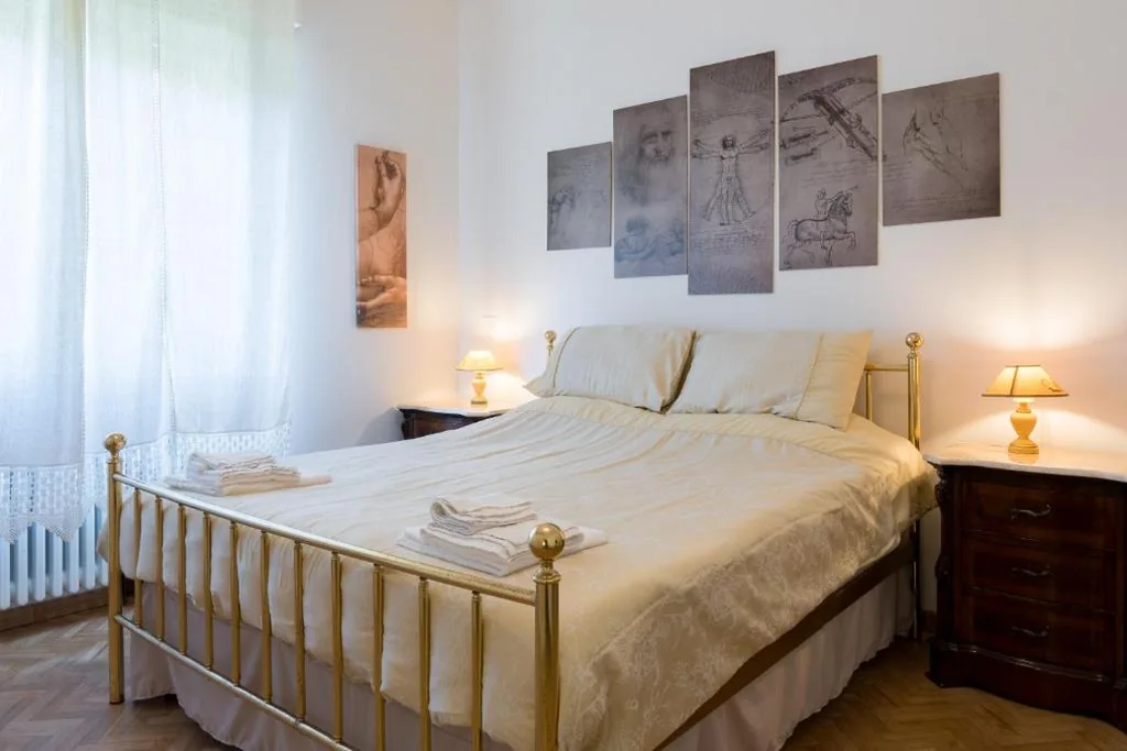 Camera Tripla con Vista Giardino — Art Rooms