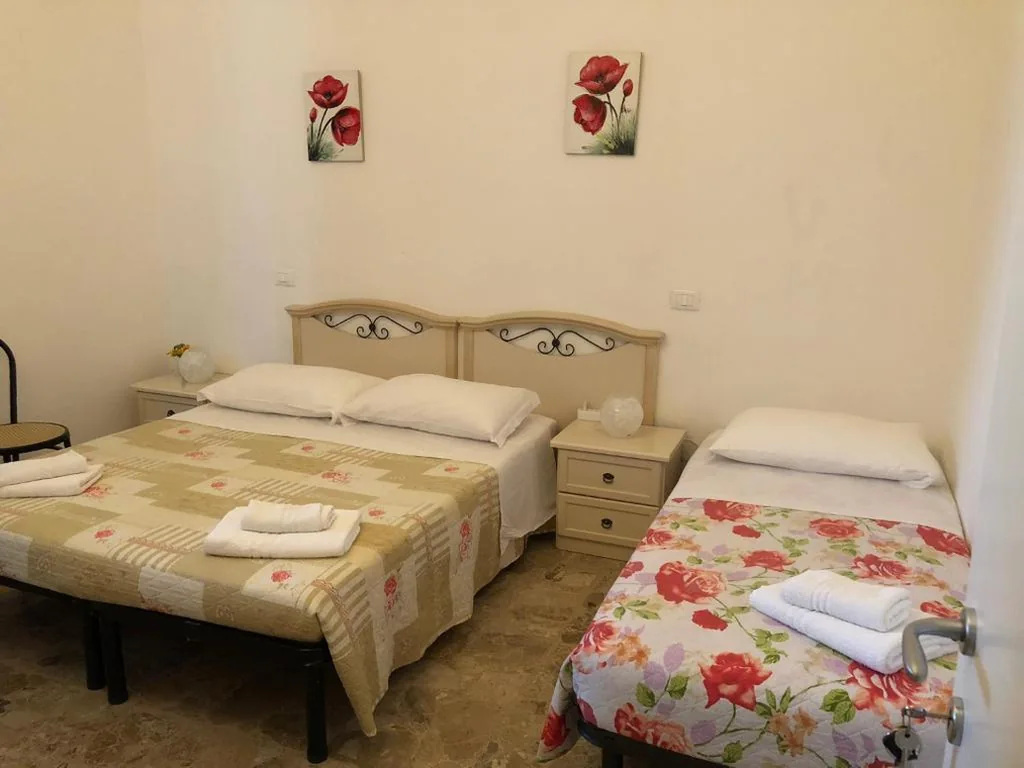 Triple Room with Garden View — Home Sweet Home B&B