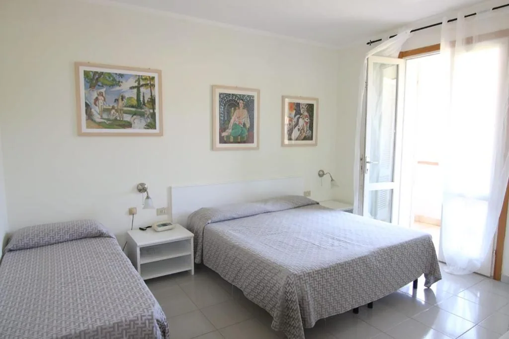 Triple Room with Garden View — Residence Hotel Villa Mare
