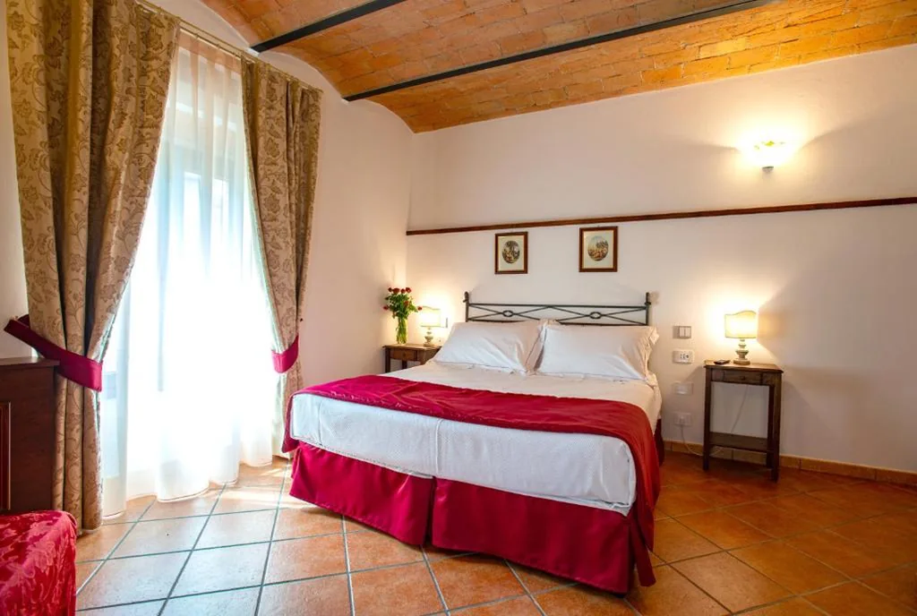 Camera Tripla con Vista Giardino — Torciano Hotel Wine & Winery, Tuscany