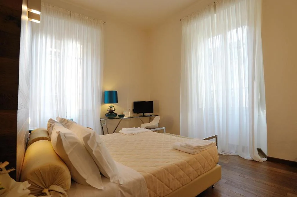 Camera Tripla con Vista — Luxury B&B La Dimora Degli Angeli
