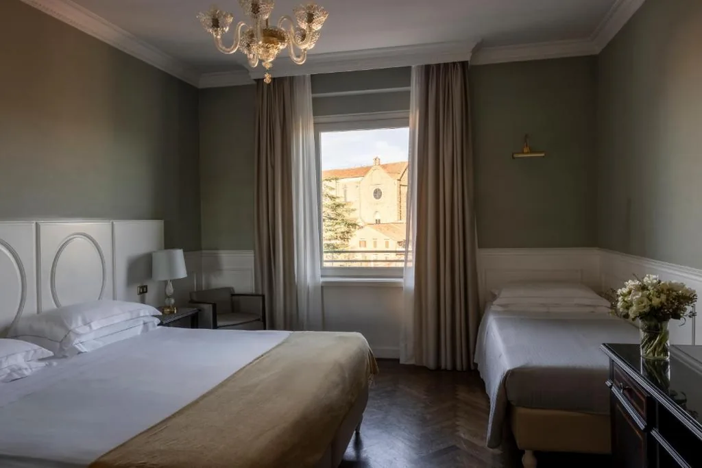 Triple Room with View — Plaza Hotel Lucchesi