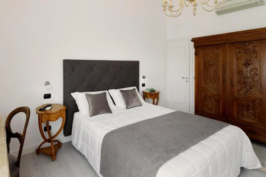 Deluxe Triple Room — Hotel Berna