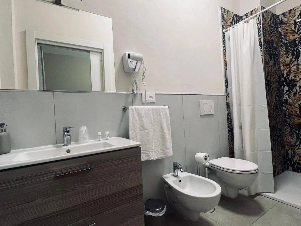 Deluxe Triple Room — Il Galileo Rooms