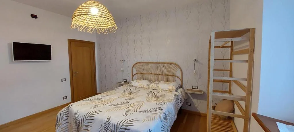 Camera Tripla Deluxe — La Casa di Angela Charming Rooms