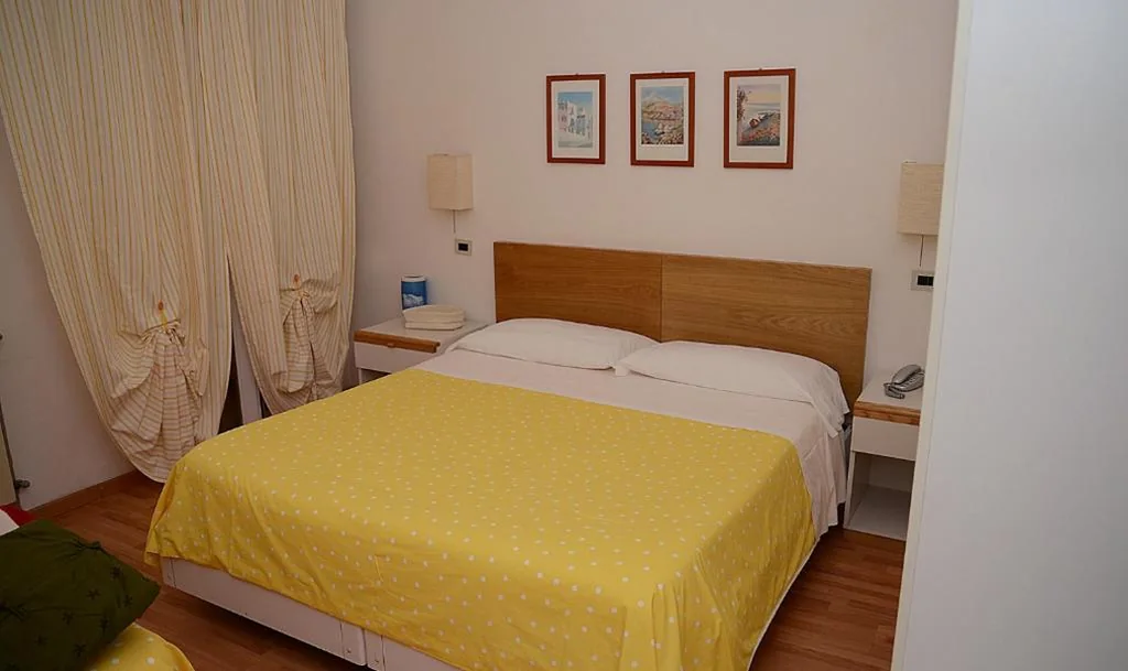 Economy Triple Room — Hotel Kinda