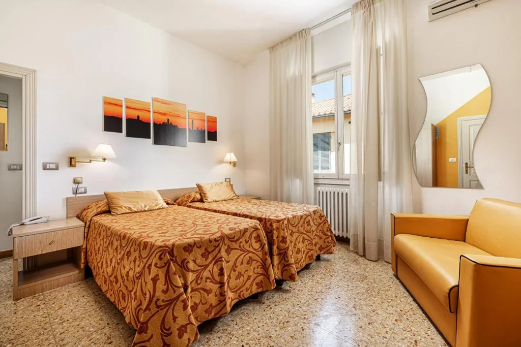 Camera Tripla Economy — Hotel Minerva