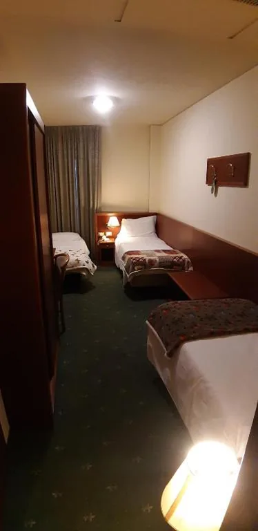 Camera Tripla Economy — Hotel Piero Della Francesca