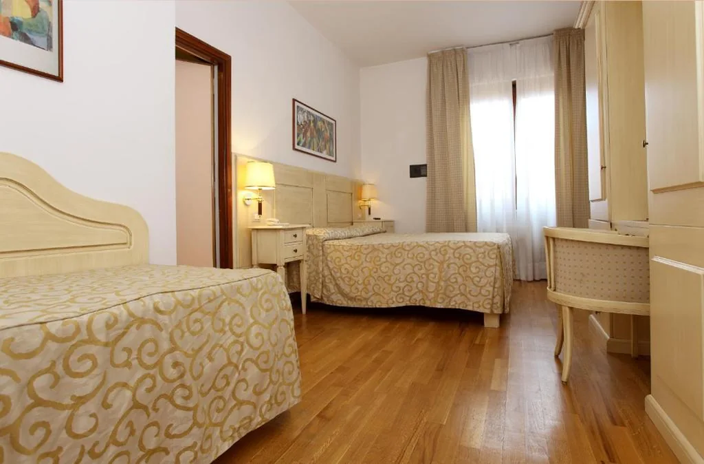 Triple Room — Grand Hotel Duomo
