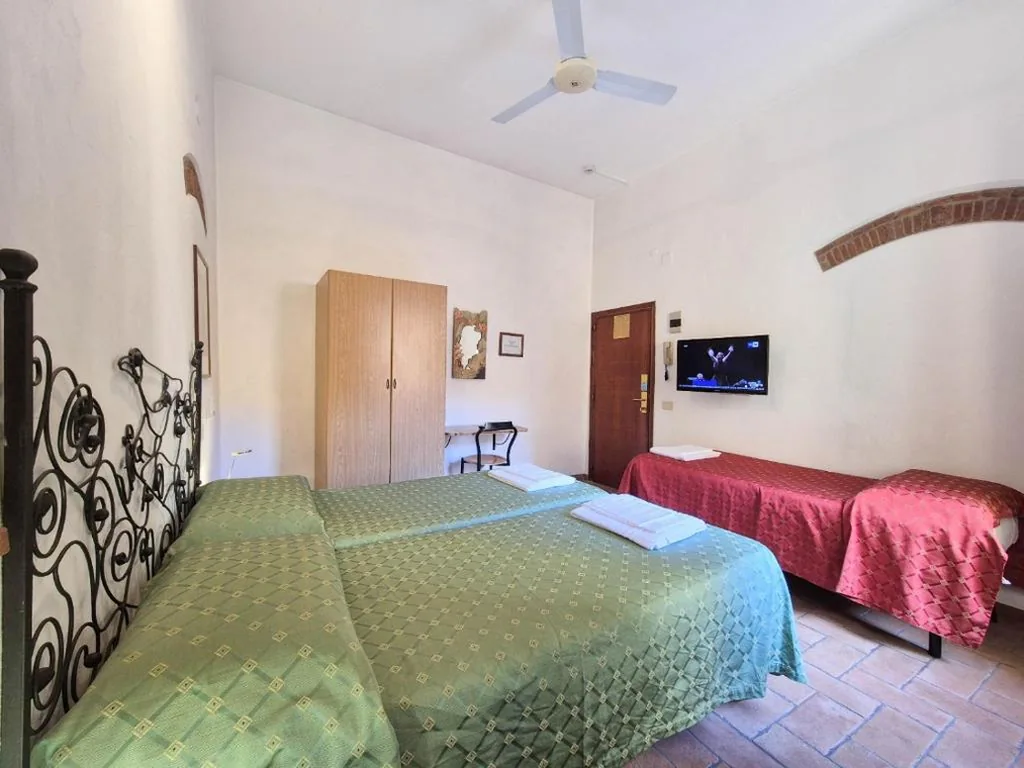 Triple Room — Helvetia Pisa Tower