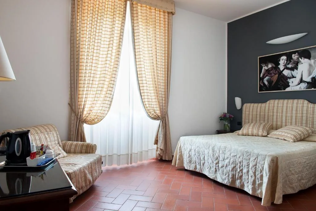 Triple Room — Hotel Caravaggio
