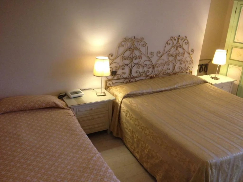 Triple Room — Hotel Corallo