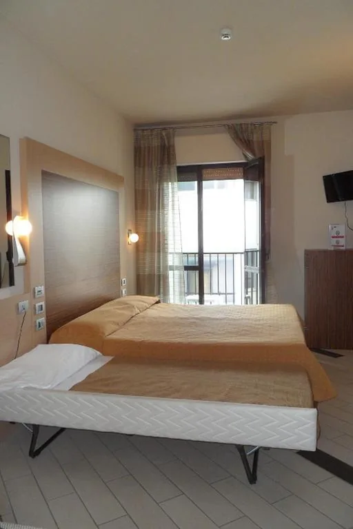 Triple Room — Hotel Eden