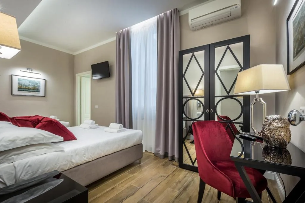 Camera Tripla — Hotel Emma Small Luxury Hotel