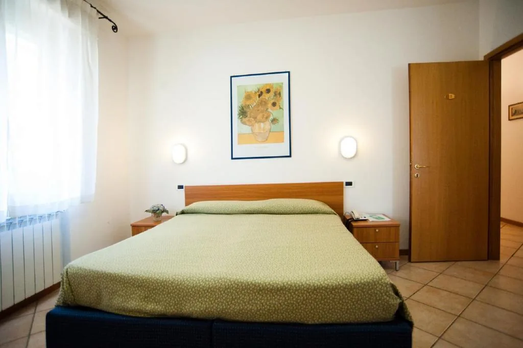 Triple Room — Hotel La Toscana