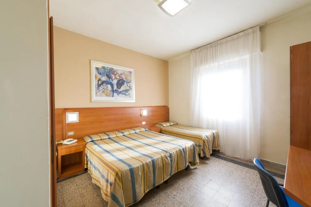 Triple Room — Hotel Moderno