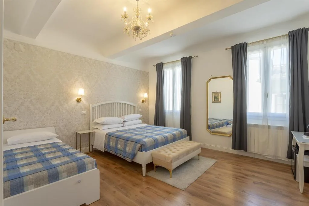 Camera Tripla — Relais Sampaoli