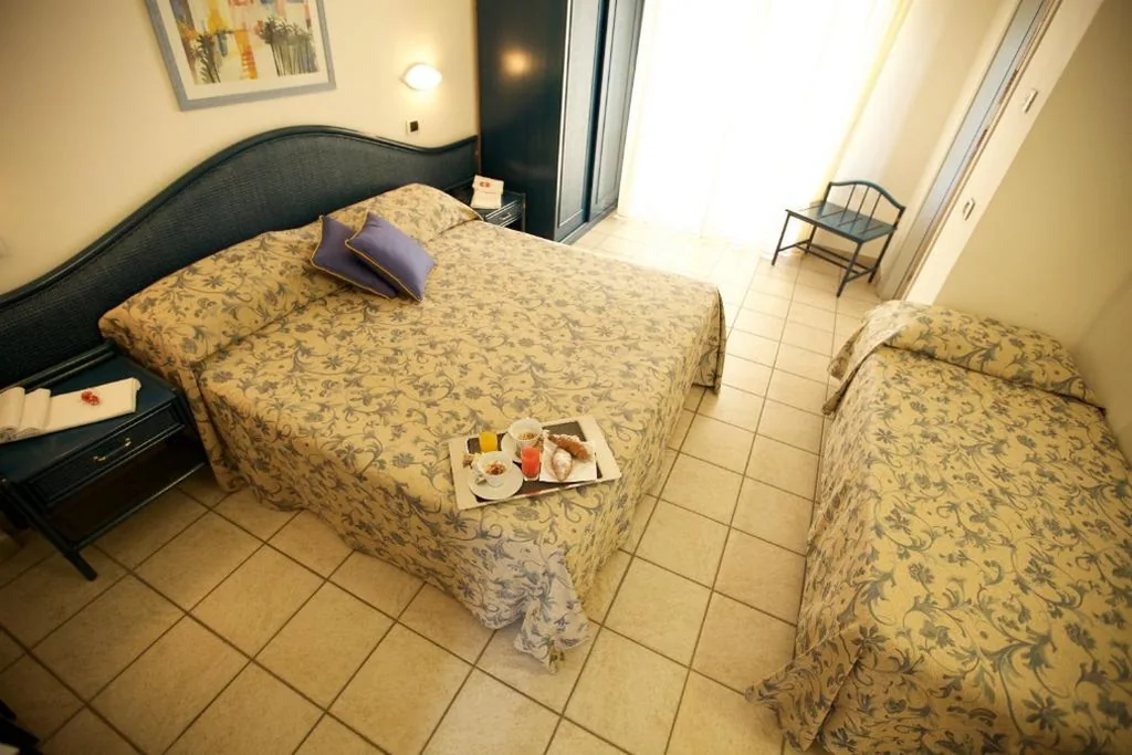 Camera Tripla Standard — Hotel il Delfino