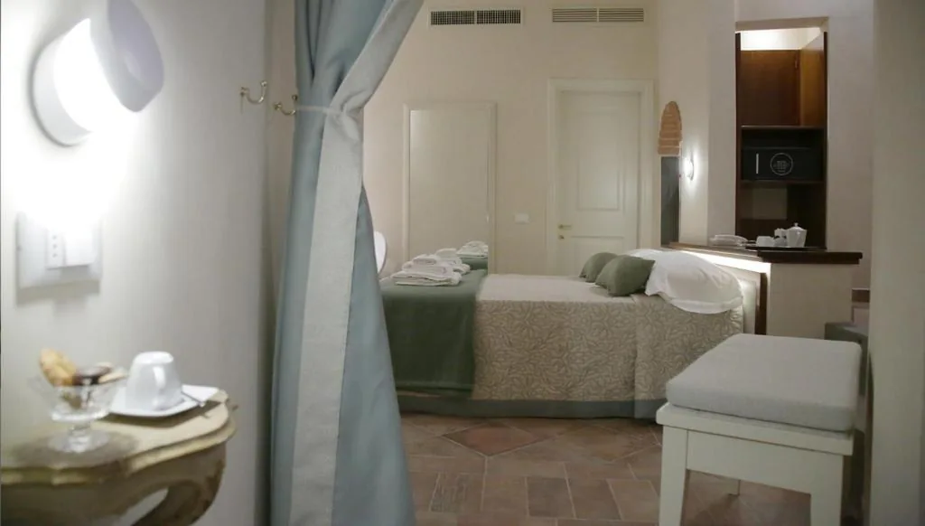 Camera Tripla Standard — Hotel Renaissance
