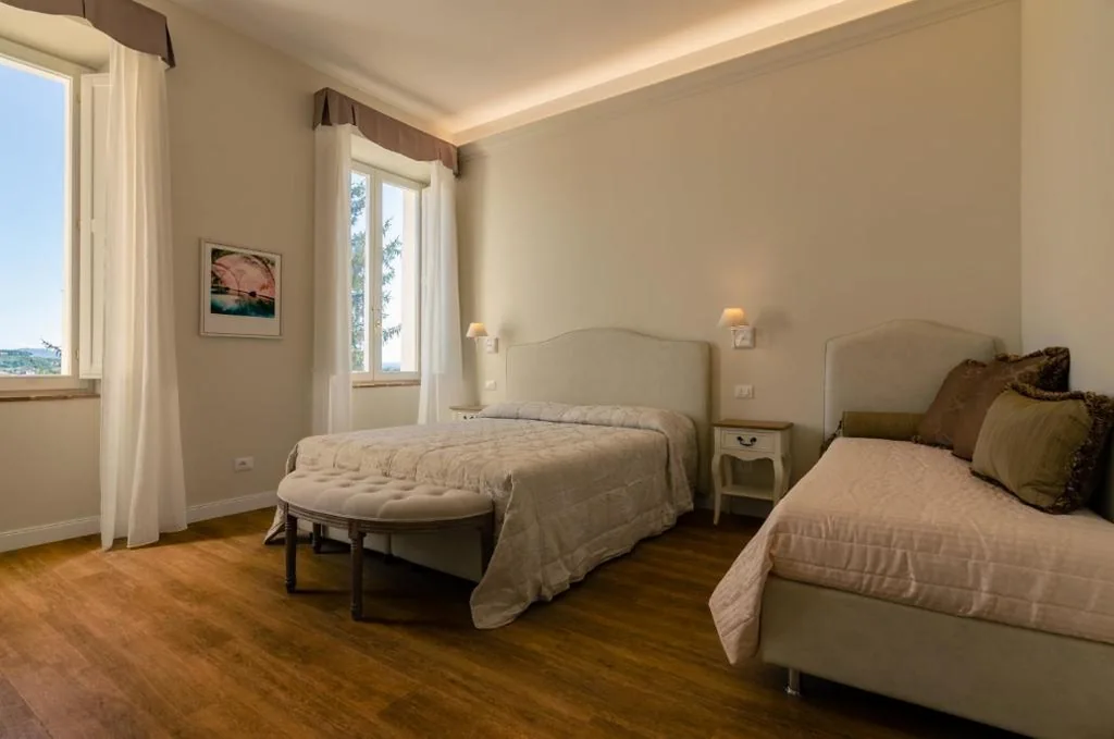 Camera Tripla Superior con Vista Giardino — Il giardino di Pantaneto Residenza D’Epoca