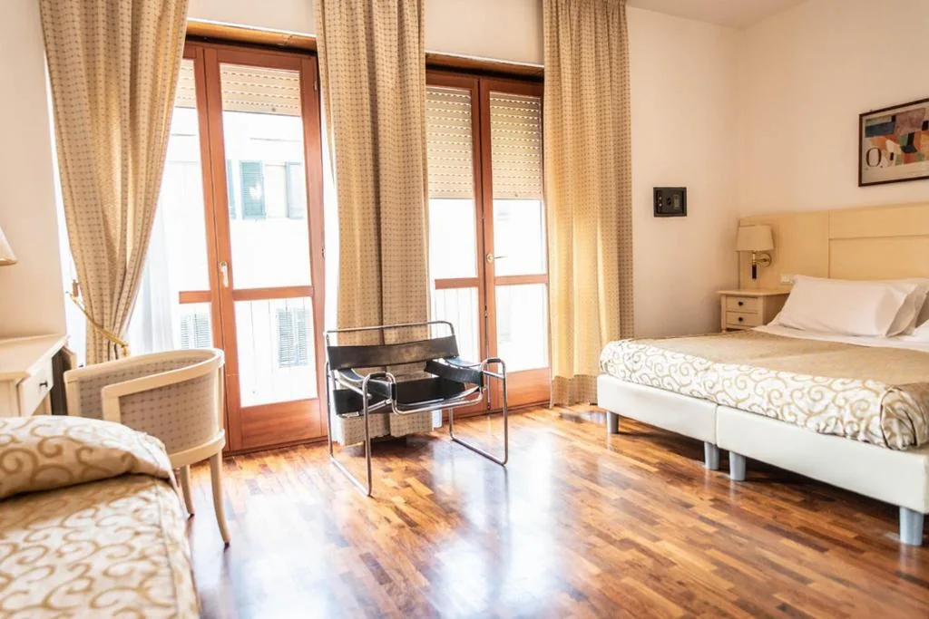 Superior Triple Room with View — Grand Hotel Duomo