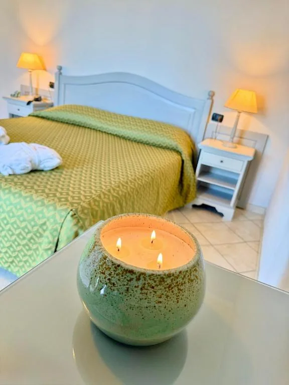 Superior Triple Room with Sea View — Hotel La Pigna