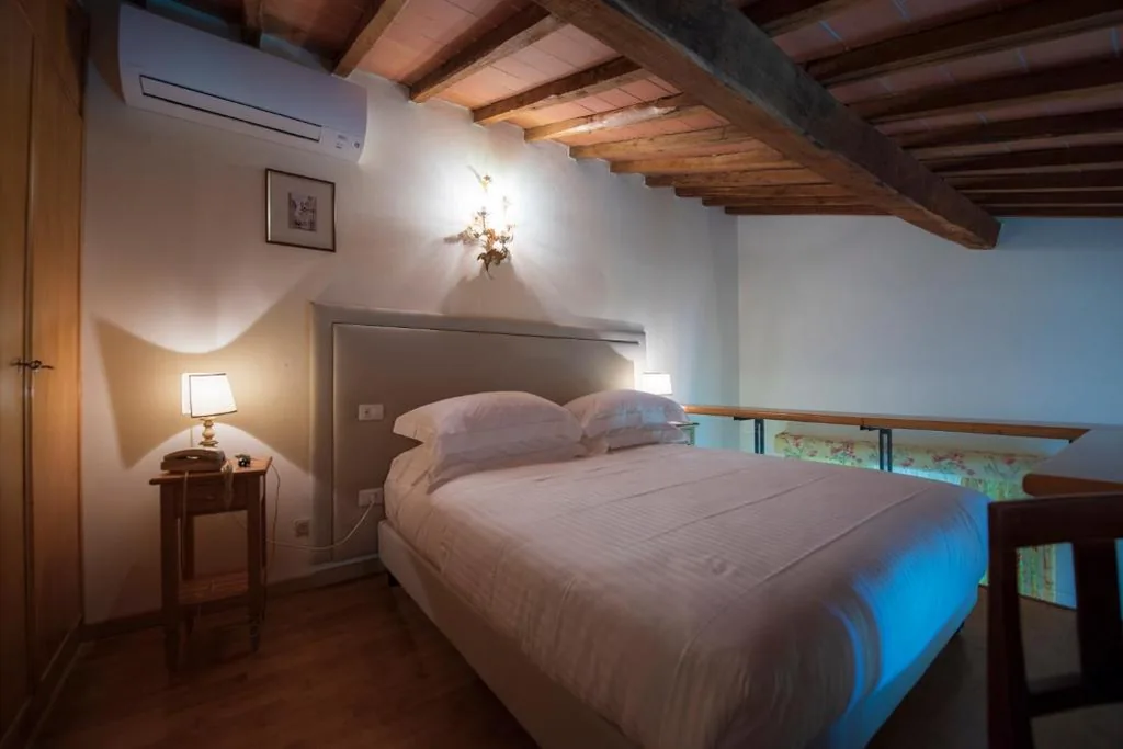 Superior Triple Room - Annex — Villa Scacciapensieri Boutique Hotel