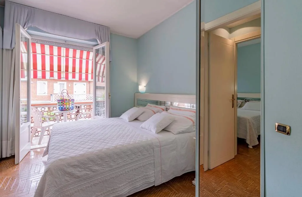 Two Connecting Double Rooms with Balcony (2 Adults + 2 Children) — Hotel Matilde