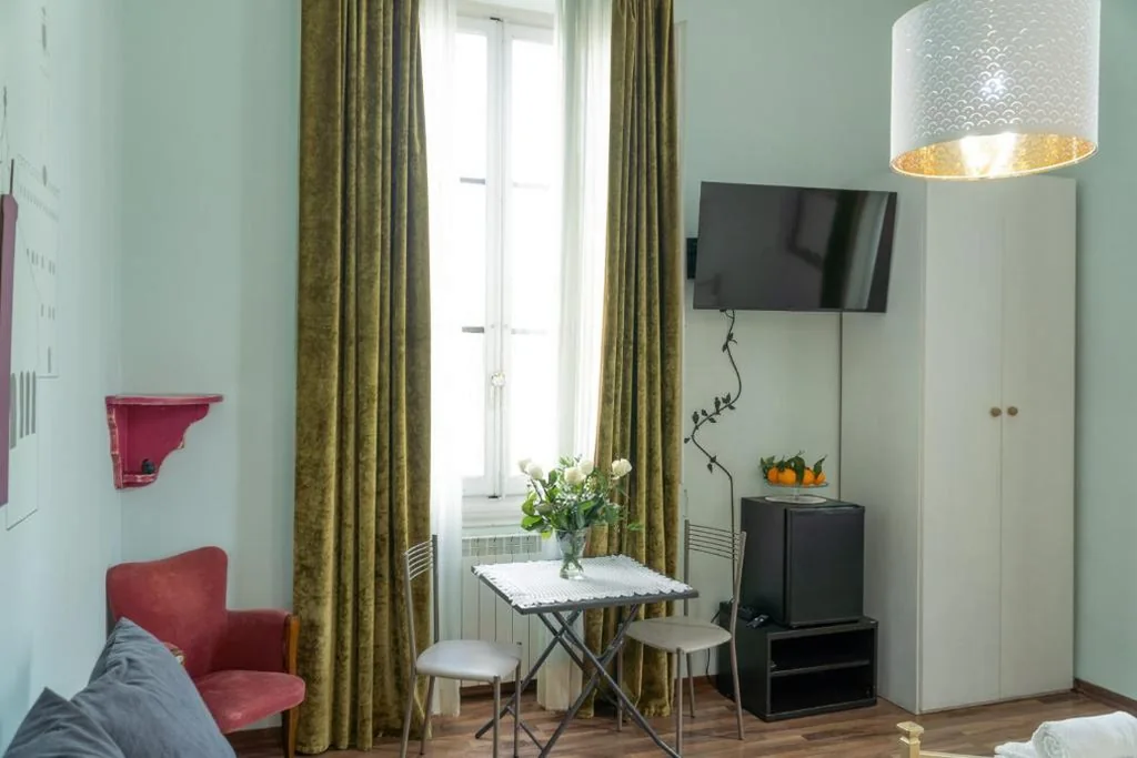 Due connecting rooms with city view — Affittacamere Firenze in Libertà Parterre