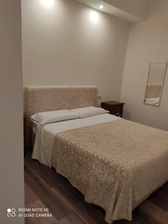 Junior Suite con Balcone — Gemini camere e suites