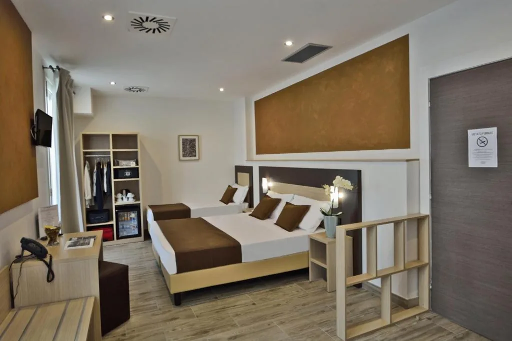 Junior Suite con Balcone — Hotel Luxor Florence