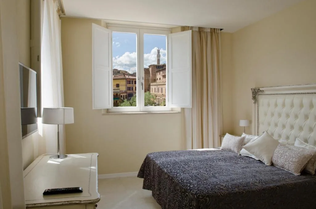 Junior Suite with City View — Villa del Sole Siena