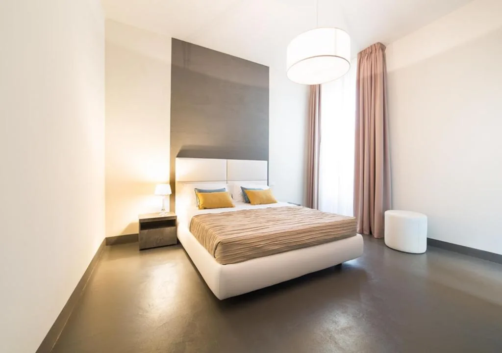 Junior Suite con Vista Giardino — LUCUS Exclusive Bed and Breakfast