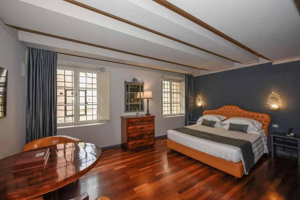 Junior Suite Deluxe — The Tuscanian Hotel