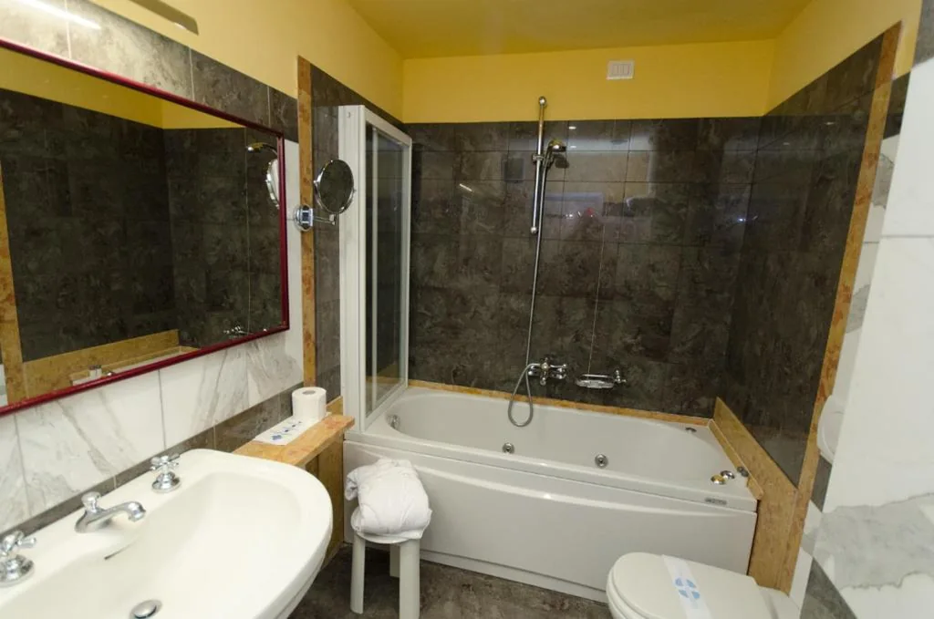 Suite with Balcony — Grand Hotel Tamerici & Principe