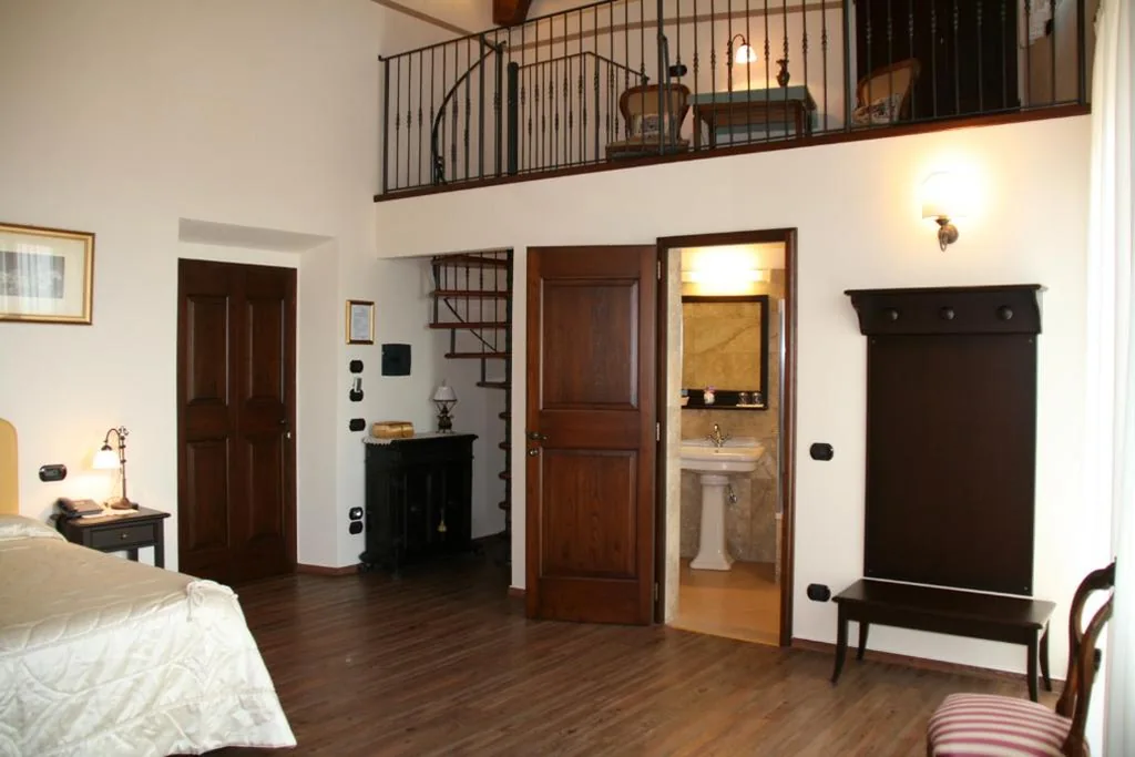Suite with Balcony — Meublé il Riccio