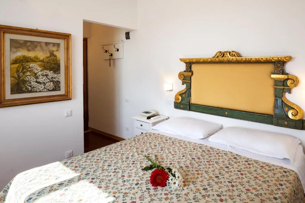 Suite con Vista Montagna — Hotel Porta Romana – LuceHotels