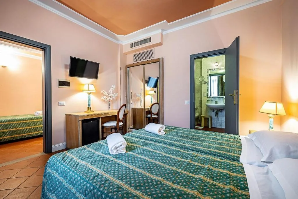 Family Suite with Balcony — Grand Hotel Panama Firenze