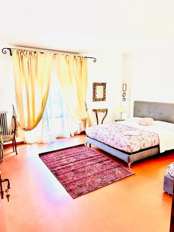 Triple Room with Private Bathroom And Balcony — Cisanello Guest House