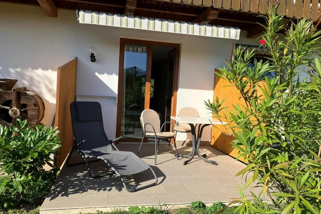 1-Bedroom Apartment with Terrace — Appartements Weisshauserhof