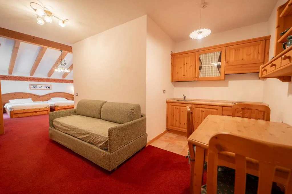 Appartamento Suite — Dolomiti Hotel Cozzio