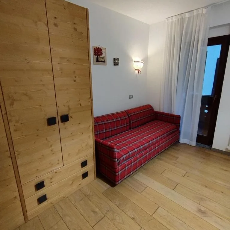 Camera Familiare (2 Adulti + 2 Bambini) — Dolomiti Hotel Cozzio