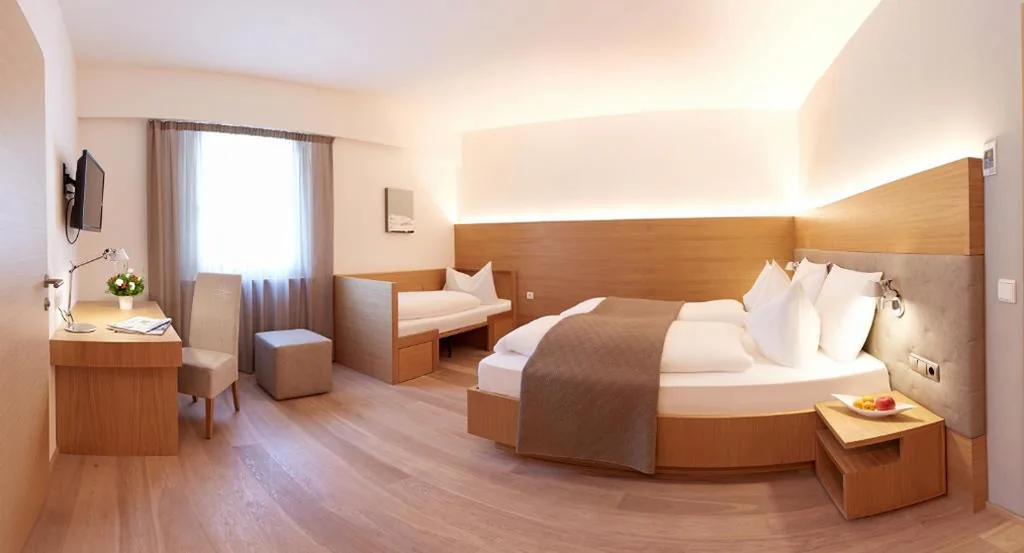 Family Room (2 Adults + 2 Children) — Hotel Post Gries