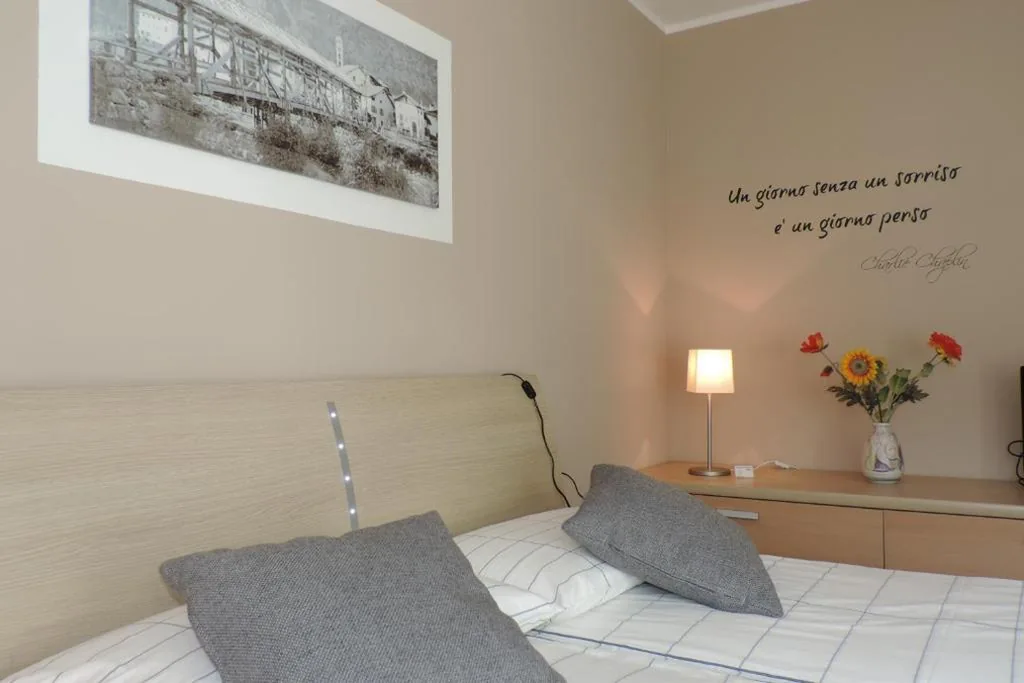 Camera Familiare con Vista Giardino — B&B Casa Vanzetta