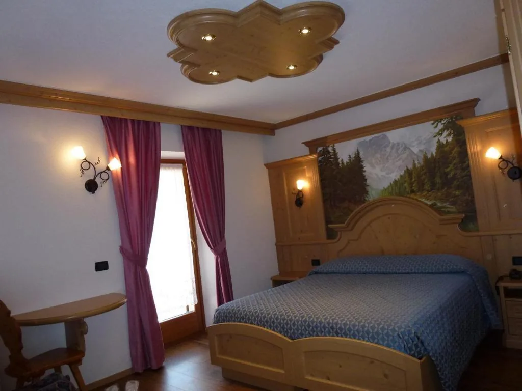 Camera Familiare con Vista Montagna (2 Adulti + 2 Bambini) — Hotel Laurino