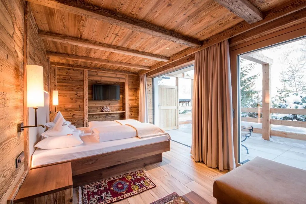 Camera Familiare Deluxe — Charmehotel Uhrerhof – Deur