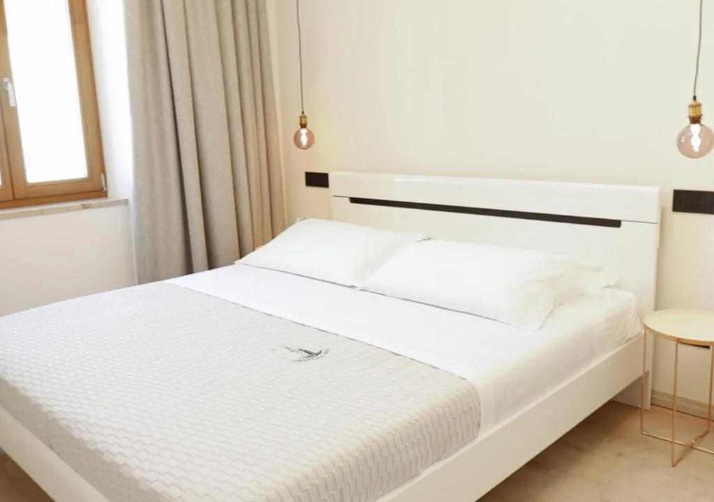 Camera King Deluxe — Tower Suite Trento
