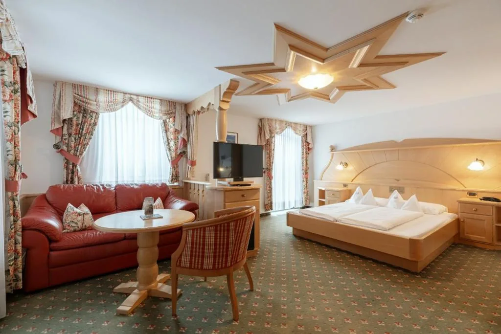 Camera Matrimoniale Comfort con Balcone — Piccolo – Dolomites & Gourmet Hotel